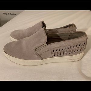 Michael Kors: Grey suede slip on sneakers